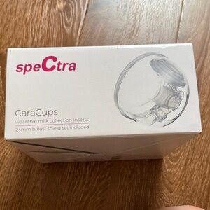 Spectra two CaraCups Wearable Milk Collection Inserts 24MM one is open